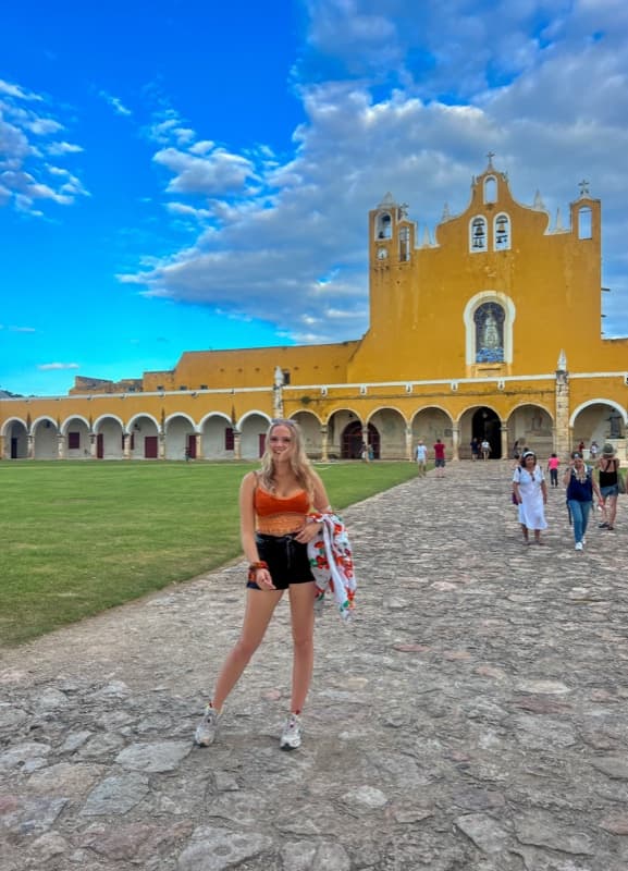 Evelyne at the yellow church in Izamal, Mexico